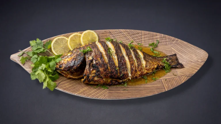 سمك دنيس بالفرن مع زيت الزيتون والليمون